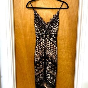 ASTR dress size medium with criss cross straps in back.